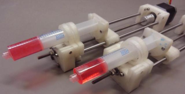 Researchers can now save thousands of dollars and slash the time it takes to complete experiments by printing parts for their own custom-designed syringe pumps. Members of Joshua Pearce's lab made this web-enabled double syringe pump for less than $160. Credit: Emily Hunt